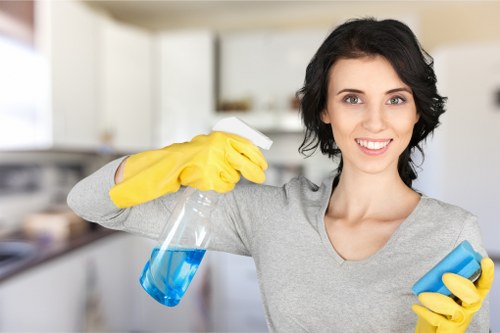 Technician using safe cleaning chemicals